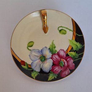 Flowered Plate with Finger Hold